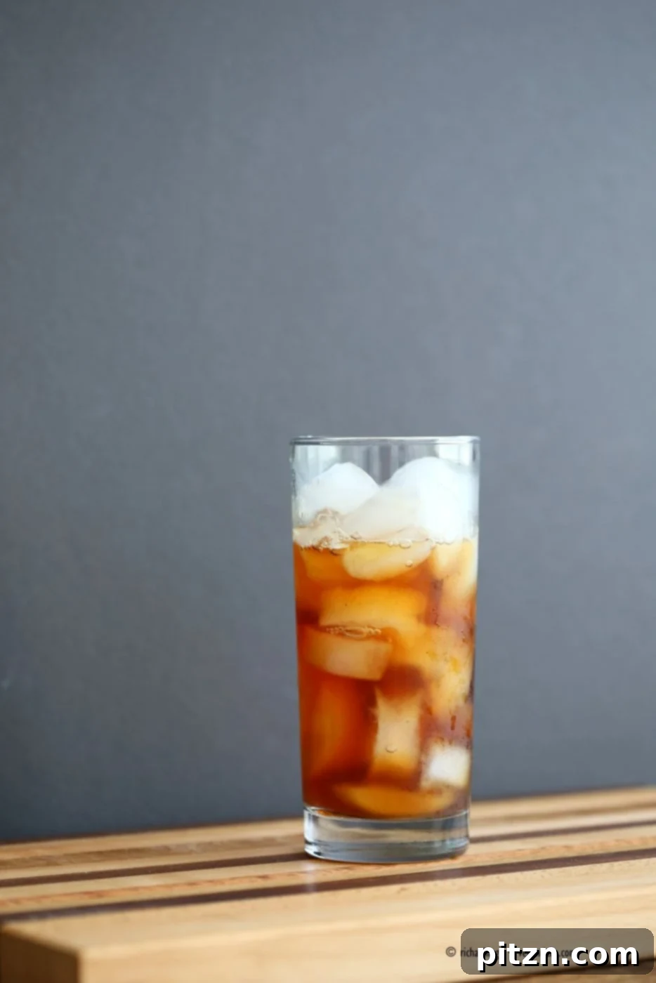 Cardamom Cinnamon Turmeric Iced Tea. Spiced Iced tea like Thai Iced tea with turmeric coconut milk and Indian masala chai spices and ginger. Golden Milk Iced Tea. Vegan Gluten-free Soy-free Recipe | VeganRicha.com
