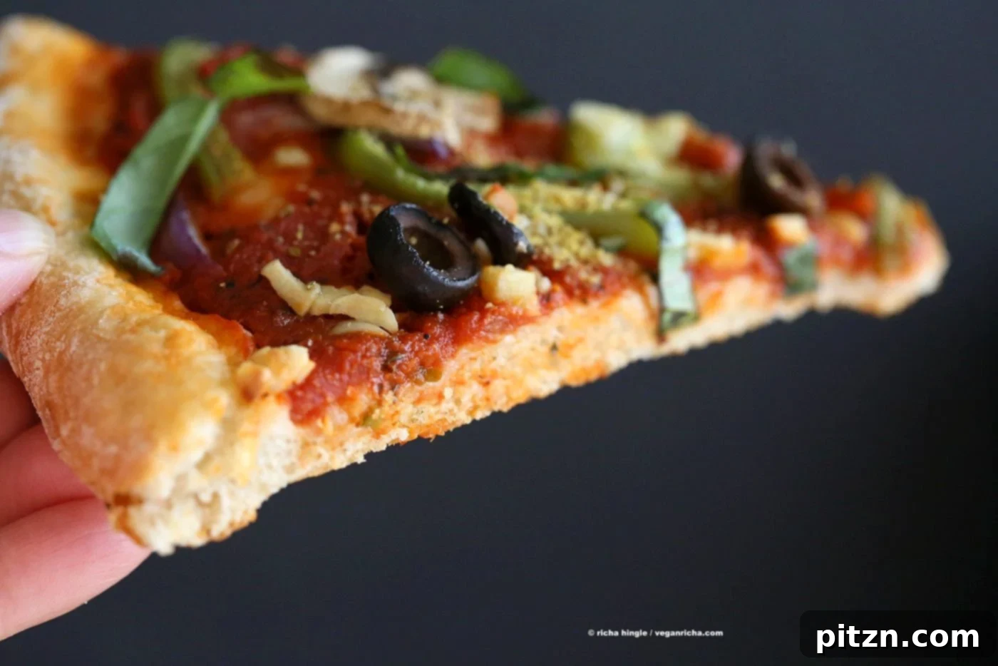 Effortless Vegan Vegetable Pizza with 20 Minute Crust 7 Easy Veggie Vegan Pizza with 20 minute Almost No Knead Crust! Pizza Sauce, Veggies, Mushrooms, Kalamata Olives baked to perfection. Dressed with Vegan Parmesan and fresh basil. Vegan Soy-free Recipe. Can be Nut-free | VeganRicha.com