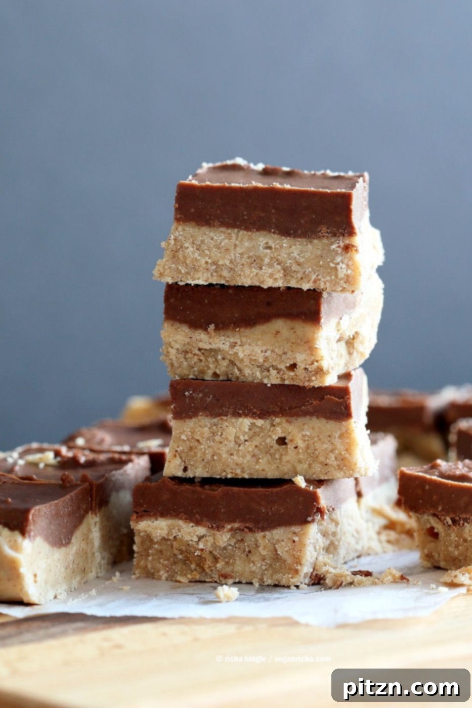Decadent Chocolate Almond Butter Fudge Bars 5 Delicious Vegan Chocolate Almond Butter Fudge Bars, photographed to highlight their layered design. This is an easy, no-bake, gluten-free, and soy-free recipe using nut butter, coconut butter, and maple syrup.
