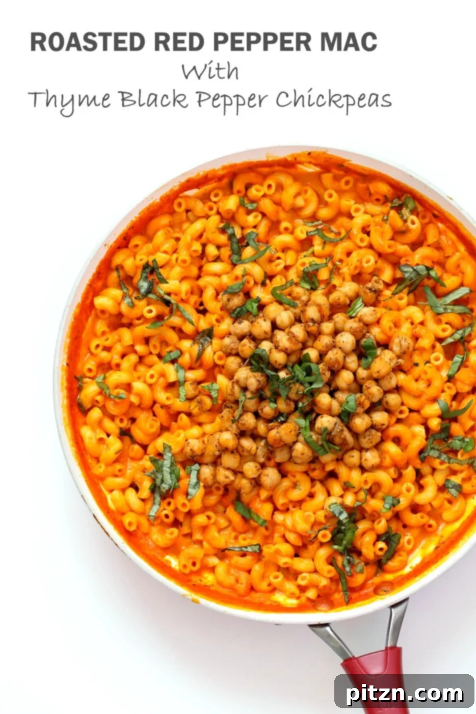 Creamy Roasted Red Pepper Pasta with a Kick of Black Pepper Chickpeas 2 A close-up shot of creamy roasted red pepper pasta with crispy black pepper chickpeas and fresh basil, served in a bowl. Perfect for a vegan, soy-free, and gluten-free meal.