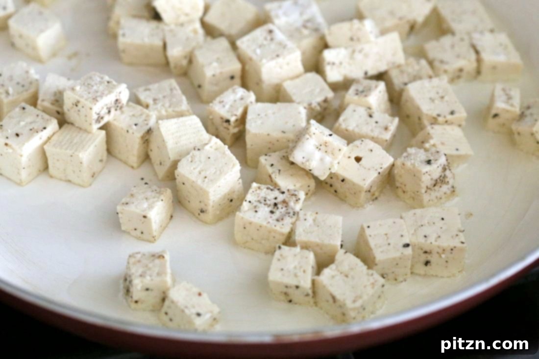 Indian Chilli Tofu Recipe 3 Chilli Tofu - Indian Chilli "Paneer" Recipe. Chilli Paneer is an Indo-chinese fusion stir fry served with other fusion noodles or fried rice. Crisp Tofu replaces the Paneer cheese in this delicious and quick version. Vegan Gluten-free Nut-free Recipe | VeganRicha.com