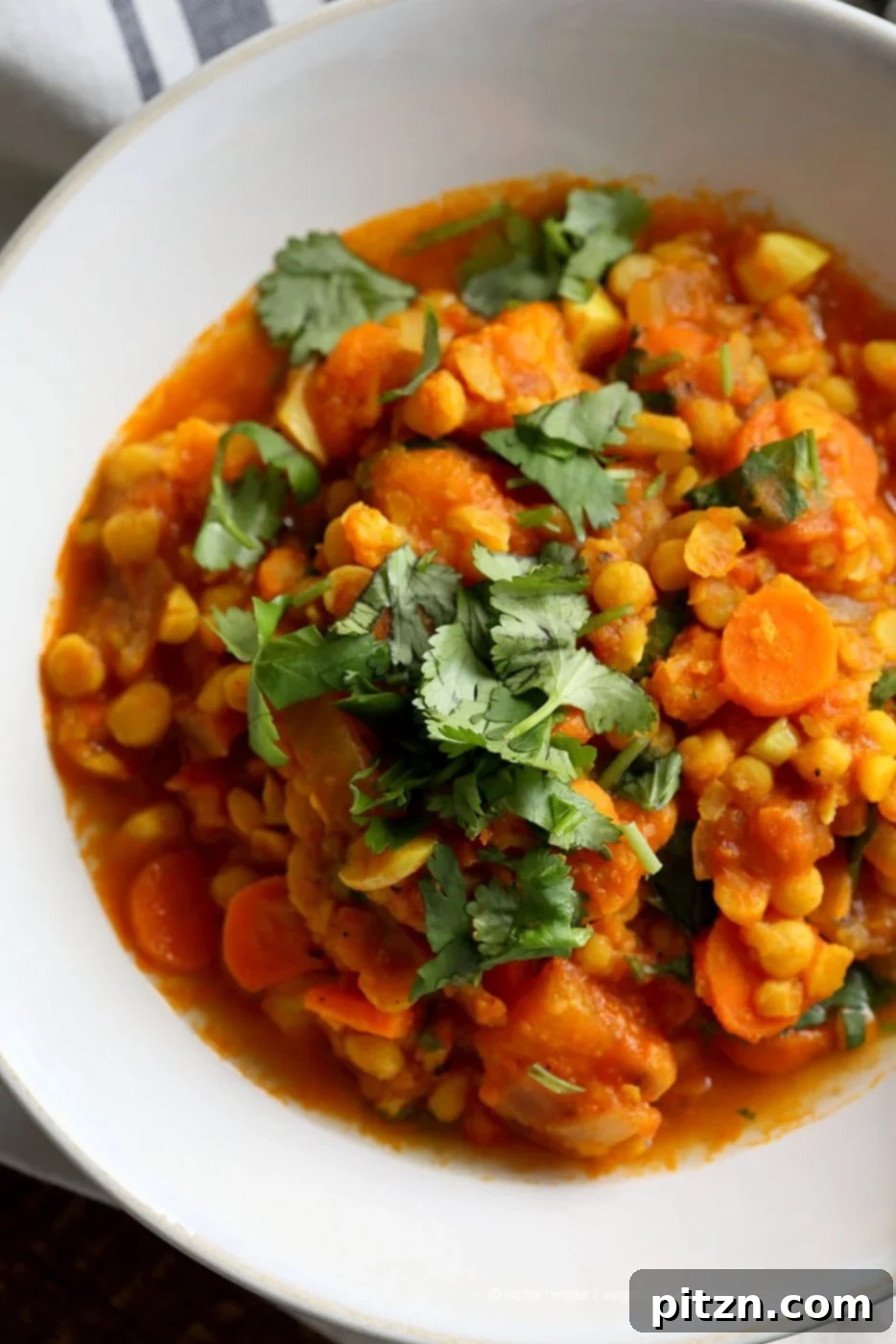 Chana Dal Veggie Carrot Soup. Easy Split Pea Soup with veggies. 1 Pot ready within 45 minutes. Use split chickpeas (Chana Dal) or other split peas or lentils. Vegan Gluten-free Soy-free Recipe | VeganRicha.com