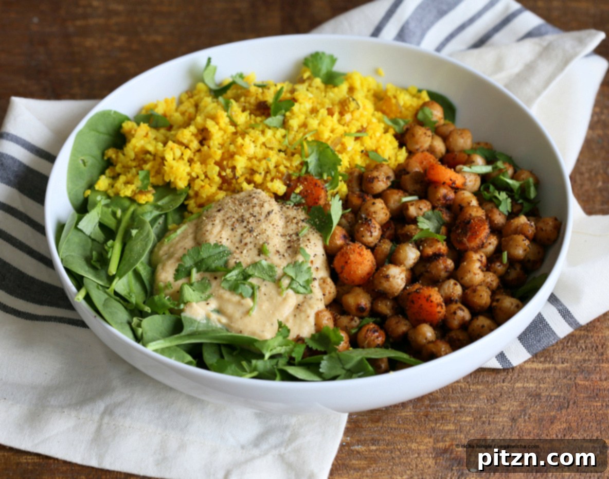 Spiced Golden Buddha Bowl with Pepper Hummus 6 Turmeric Cauliflower Rice, Spiced Chickpeas or lentils, Black pepper hummus and Greens bowl. Amazing Flavors for any meal. Ready within 25 minutes. Vegan Gluten-free Soy-free Recipe | VeganRicha.com