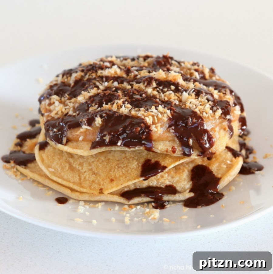 Indulgent Vegan Samoa Pancakes: Salted Date Caramel, Toasted Coconut, Chocolate Bliss 7 Vegan Samoa Cookie Pancakes with salted Date caramel, toasted coconut, chocolate drizzle. Weekend Brunch or breakfast. Can be gluten-free. | VeganRicha.com #vegan #breakfast #recipe