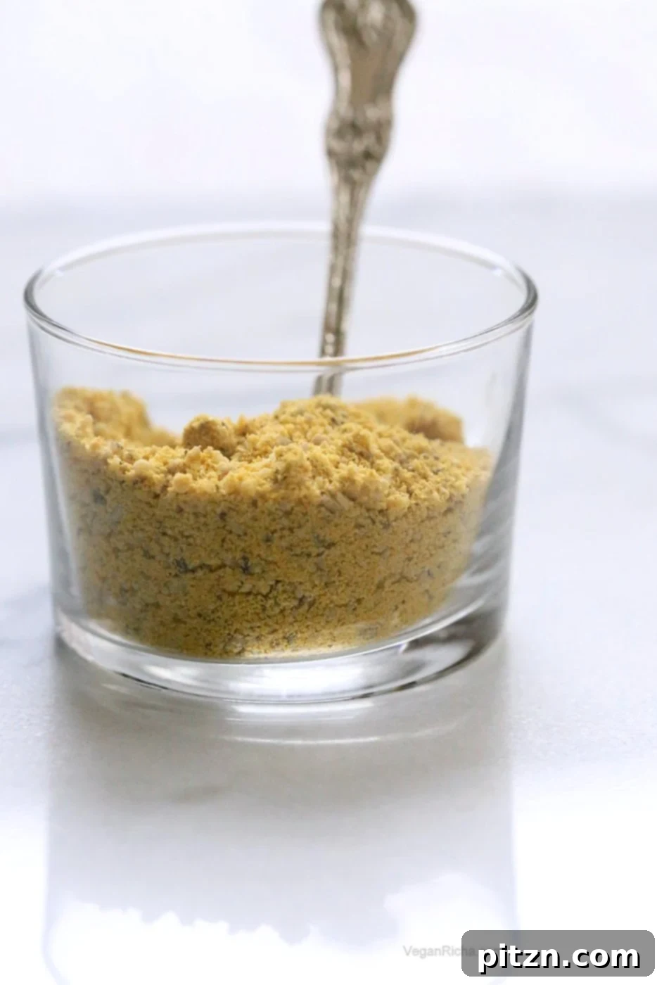 How to make Vegan Parmesan Cheese. Use Cashews, Pecans or Pepitas to make Dairy-free Parmesan cheese. Nut-free Vegan Parmesan Recipe. | VeganRicha.com