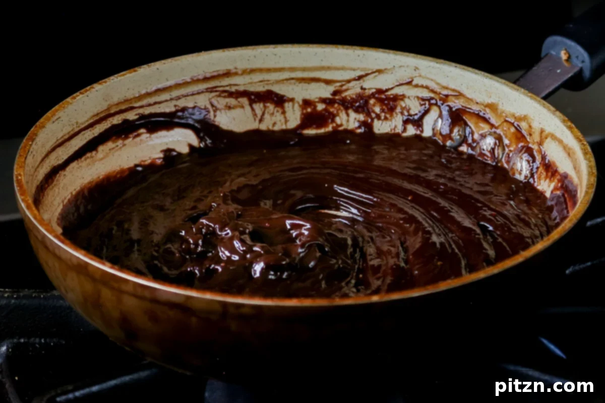Vegan Double Peanut Butter Chocolate Cake 18 Chocolate peanut butter glaze in the pan after all ingredients are melted and combined