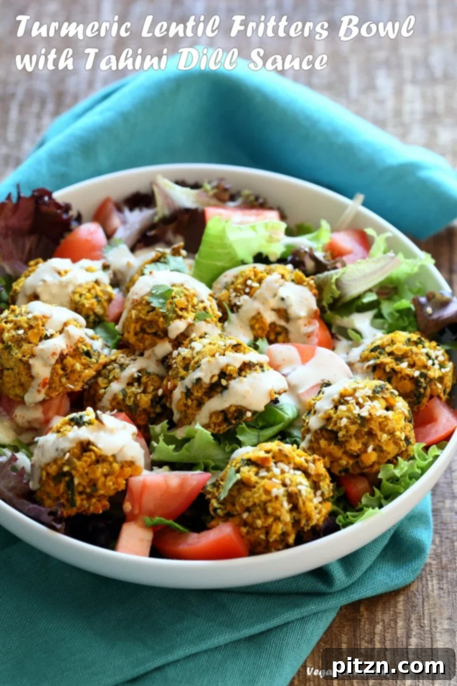 Turmeric Lentil Fritters Tomato Greens Bowl with Tahini Dill Sauce. Baked Seedy Golden Lentil fritters with greens, tomatoes and a tahini sauce make an easy Lunch bowl. Vegan Nut-free Soy-free Recipe. Easily Glutenfree | VeganRicha.com