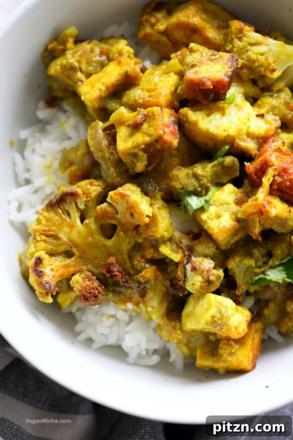 Spiced Cauliflower and Tofu in Green Masala Sauce. Baked Cauliflower and Tofu in green cilantro sauce. The sauce paste can be made ahead and stored. Vegan Gluten-free Nut-free Recipe. Can be soy-free with chickpea tofu or chickpeas or beans or other veggies. | VeganRicha.com