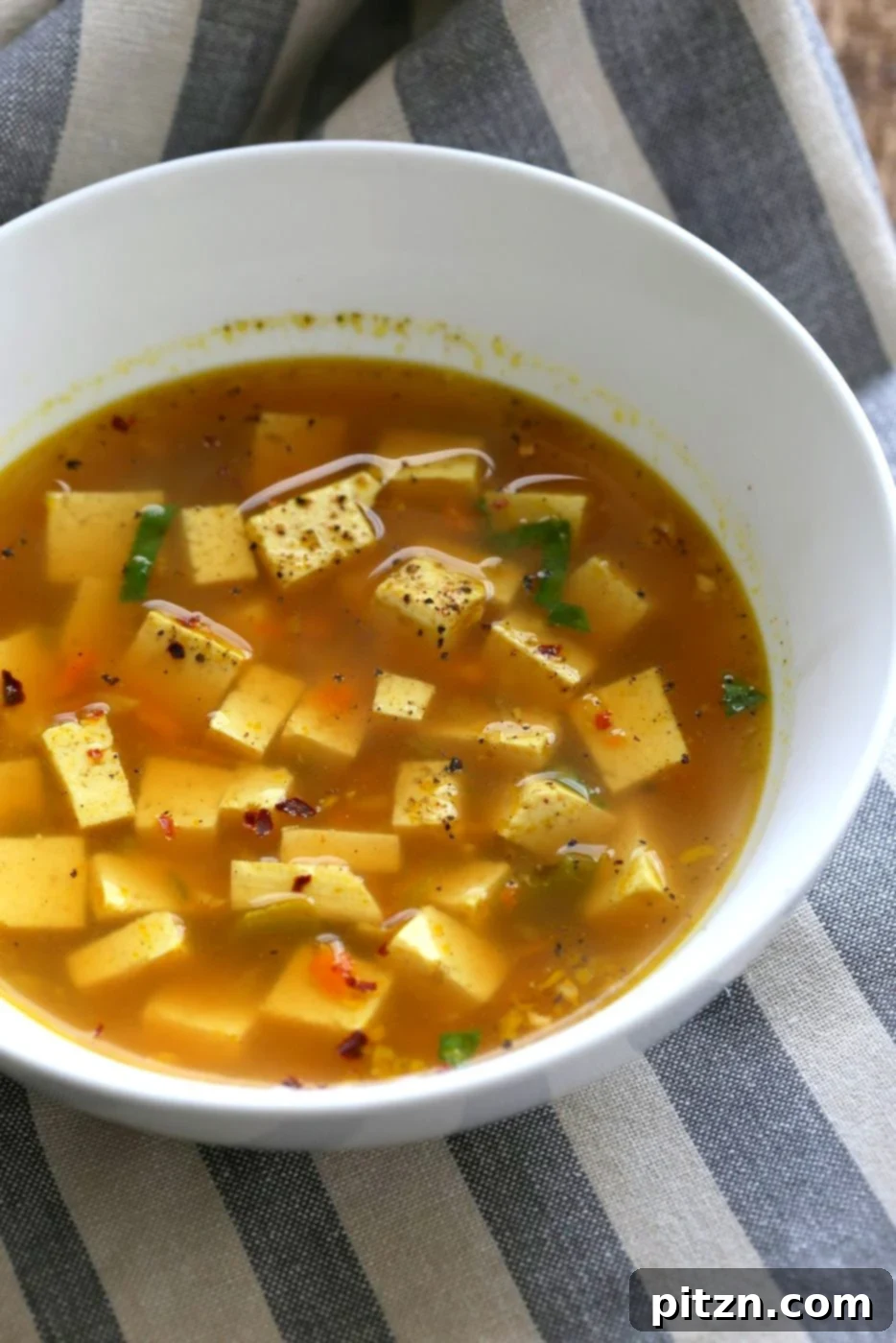 Golden Miso Bliss with Ginger, Garlic and Tofu 3 Nutrient-Packed Turmeric Miso Soup with Ginger, Garlic, and Tofu: A Healing Vegan Recipe | VeganRicha.com