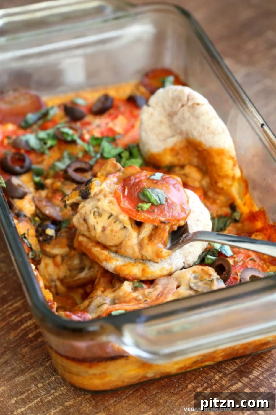 Easy Vegan Pizza Dip with sautéed mushrooms, olives, pizza sauce, and from-scratch vegan mozzarella cream sauce. Gluten-free and soy-free option available. | VeganRicha.com