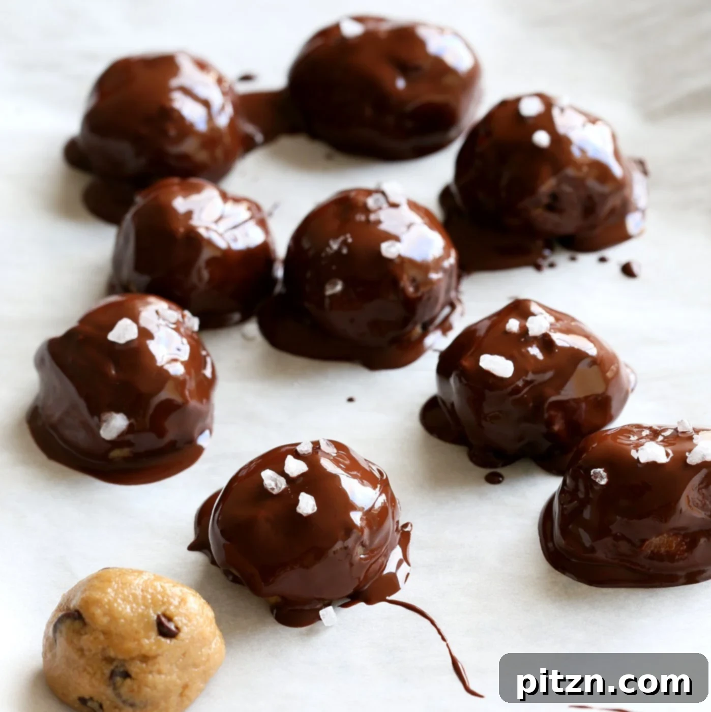 Vegan Chocolate Delights for a Sweet Valentine's Day 4 Irresistible Cookie Dough Truffles, made with fudgy vegan cookie dough, generously coated in melted chocolate and finished with a sprinkle of coarse sea salt. A delightful gluten-free recipe from VeganRicha.com
