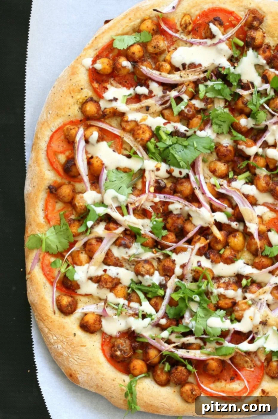 Ethiopian Berbere Chickpea Pizza with Creamy Tahini Garlic Sauce 9 Ethiopian Berbere Chickpea Pizza with Tahini Garlic Dressing. Amazingly flavorful pizza. Dress with tahini dressing, vegan ranch or other creamy dressing. Vegan Soyfree Nut-free Recipe. Gluten-free Crust option. | VeganRicha.com