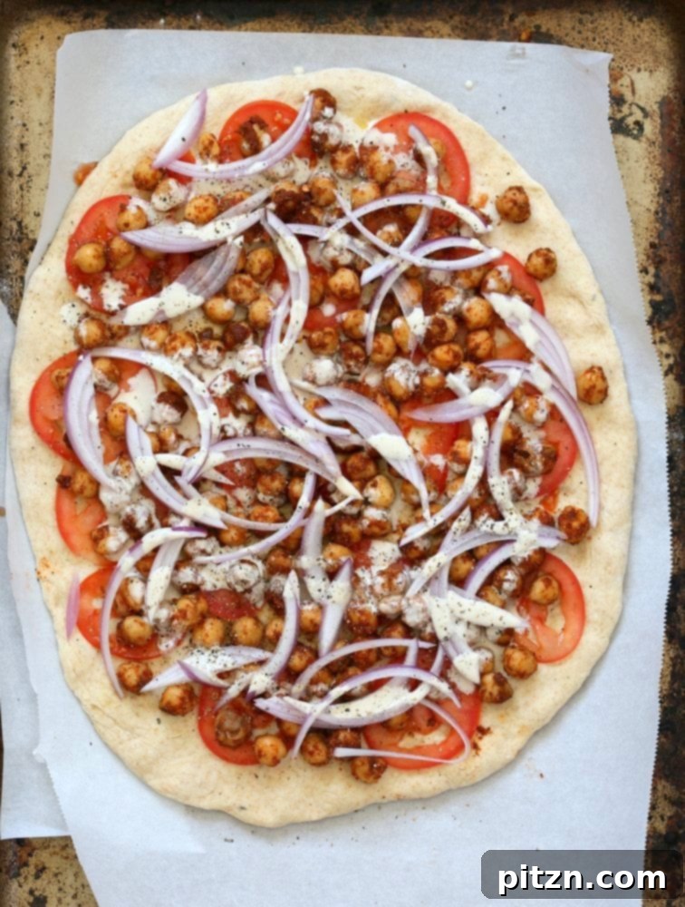 Ethiopian Berbere Chickpea Pizza with Creamy Tahini Garlic Sauce 5 Ethiopian Berbere Chickpea Pizza with Tahini Garlic Dressing. Amazingly flavorful pizza. Dress with tahini dressing, vegan ranch or other creamy dressing. Vegan Soyfree Nut-free Recipe. Gluten-free Crust option. | VeganRicha.com