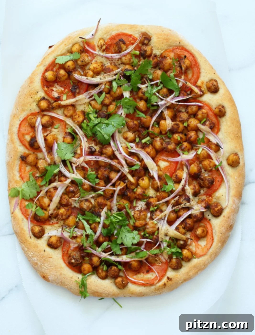 Ethiopian Berbere Chickpea Pizza with Creamy Tahini Garlic Sauce 6 Ethiopian Berbere Chickpea Pizza with Tahini Garlic Dressing. Amazingly flavorful pizza. Dress with tahini dressing, vegan ranch or other creamy dressing. Vegan Soyfree Nut-free Recipe. Gluten-free Crust option. | VeganRicha.com