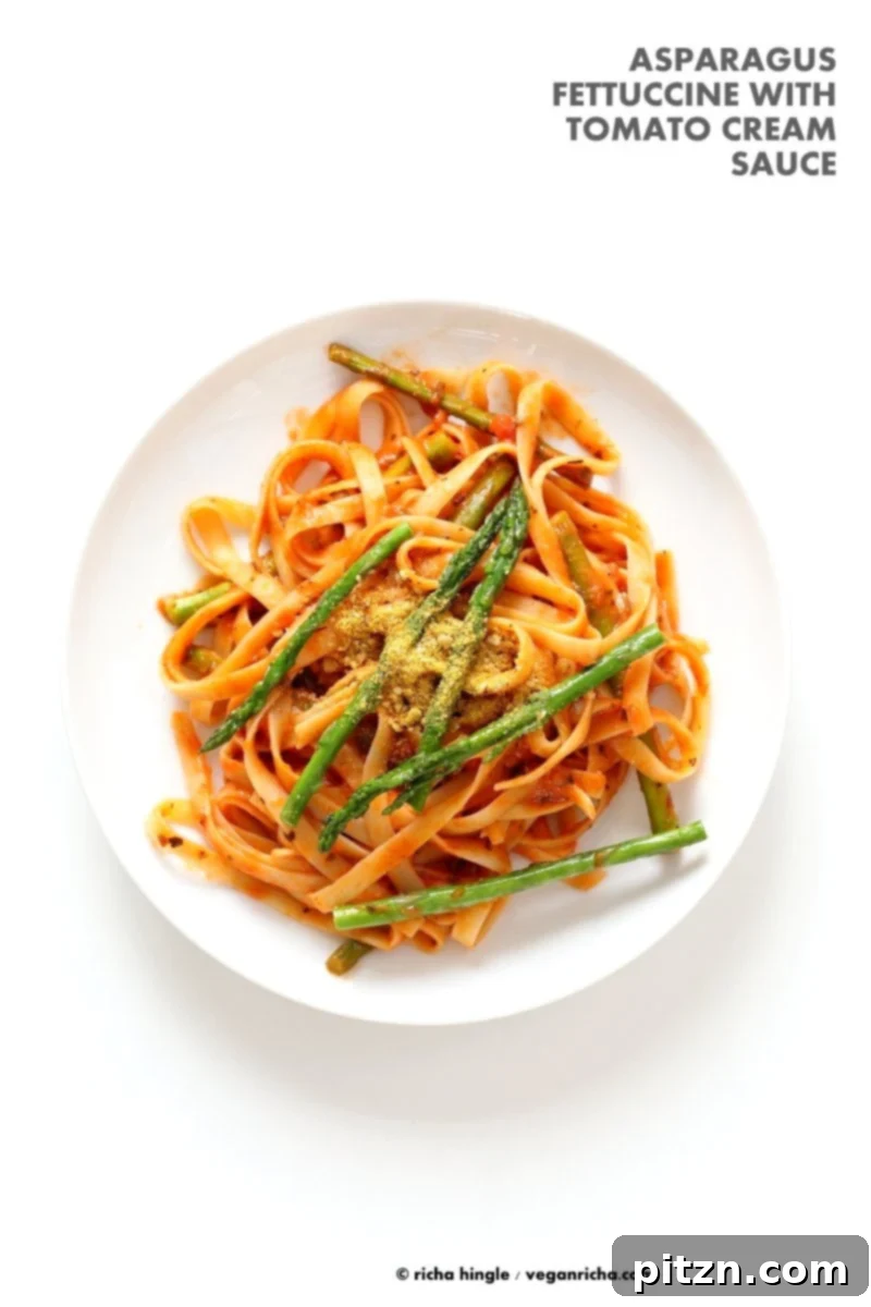 Fettuccine with Tomato Cream Sauce and Asparagus: Easy, garlic-roasted asparagus pasta, vegan and soy-free.