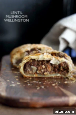 Mushroom Lentil Wellington: An impressive, easy vegan Wellington with puff pastry wrapped around a flavorful lentil, walnut, and mushroom loaf, perfect for holidays and potlucks. Adaptable for gluten-free diets.