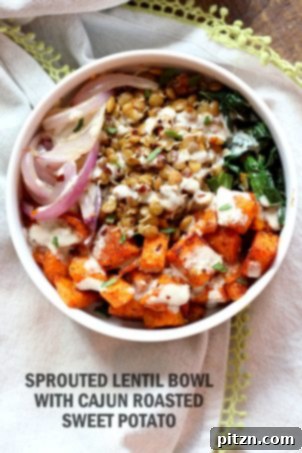 25 Easy Lentil Dishes Beyond Soup 4 Spiced Sprouted Lentil and Cajun Roasted Sweet Potato Bowl: A vibrant, healthy vegan bowl featuring flavorful sprouted lentils, roasted sweet potatoes, fresh greens, and a creamy tahini garlic dressing. This recipe is naturally gluten-free and soy-free.