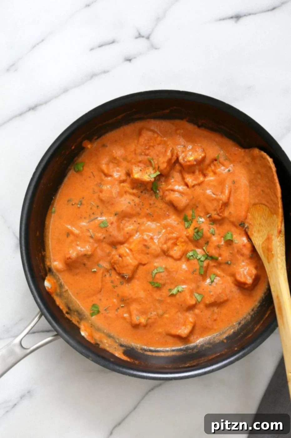 Restaurant Style Tofu Butter Masala Recipe - Indian Butter Tofu "Paneer". Dairy-free Tofu Paneer Butter Masala. Tofu is marinated and baked then simmered in tomato ginger cashew sauce. Vegan Gluten-free Recipe. | VeganRicha.com