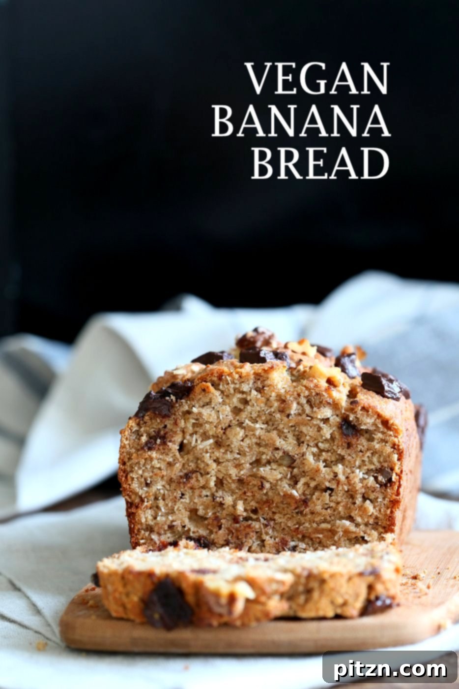 Classic super moist Vegan Banana Bread with Walnuts and toasted coconut. A delicious plant-based, no palm oil recipe for breakfast or brunch.