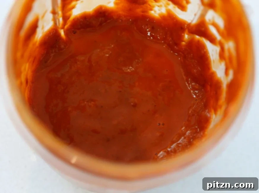 Blending the chile and sauce ingredients for Vegan Barbacoa