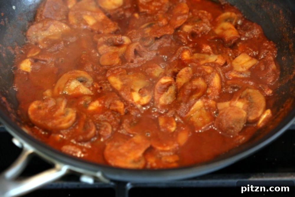 Simmering Vegan Barbacoa Mushroom Tacos sauce