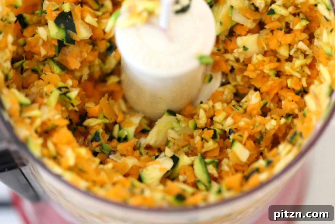 Cajun Spiced Smoky Vegan Sloppy Lentils 6 Finely shredded carrots and zucchini, perfectly prepared for adding texture and nutrition to the vegan sloppy joes.