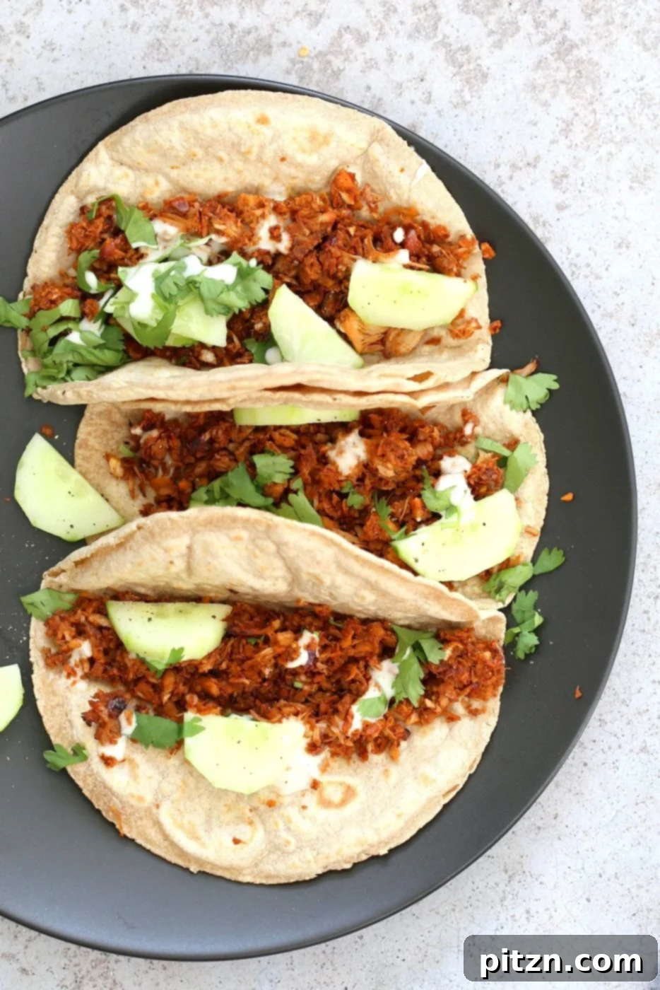 Berbere Spiced Jackfruit Tacos 7 An overhead shot of two Berbere Spiced Jackfruit Tacos, inviting and delicious, ready to be enjoyed.