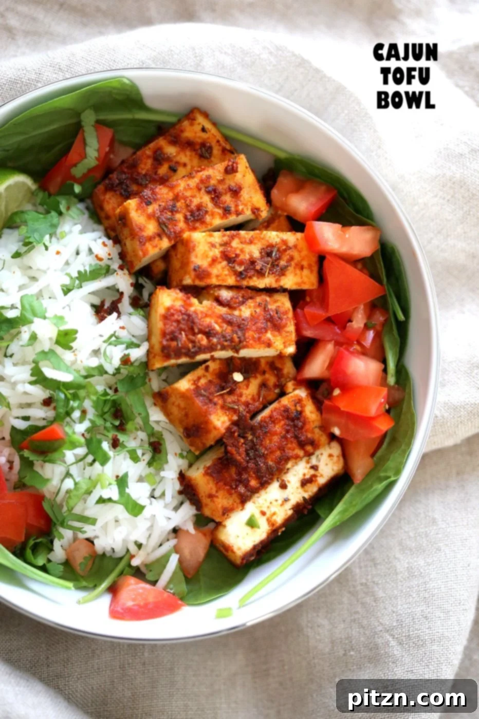 Stacked bowls of Cajun Tofu and Cilantro Lime Rice, ready for serving, emphasizing the ease of preparation and delicious presentation.