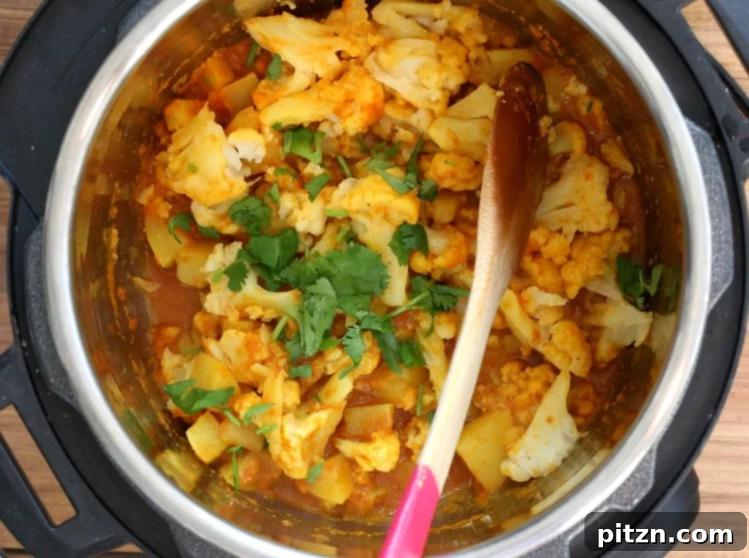 Instant Pot Aloo Gobi - Curried Potato Cauliflower. A delicious and wholesome Indian side dish, perfect for any meal. Vegan, Gluten-free, Soy-free, Nut-free recipe.