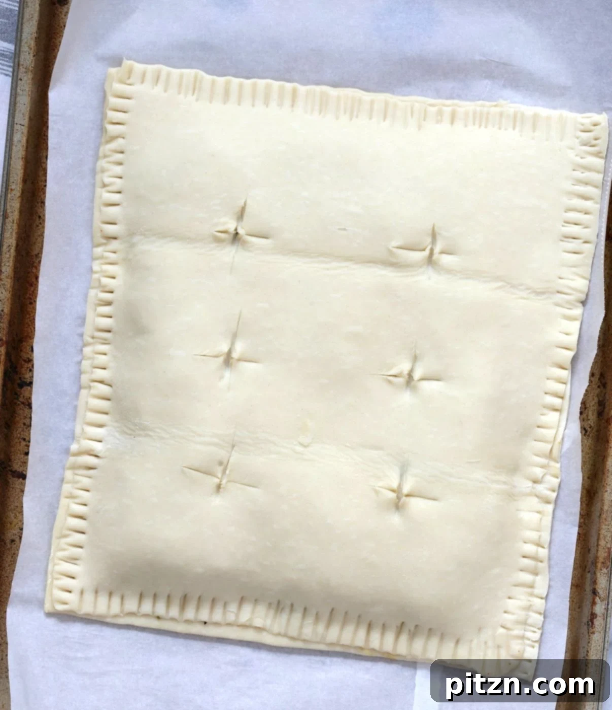 Three individual servings of Chickpea Spinach Pie, golden and inviting.