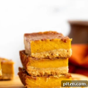 Delicious vegan pumpkin pie bars topped with coconut cream.