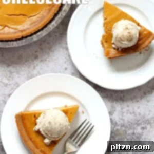 Creamy Vegan Pumpkin Cheesecake with a graham cracker style crust, garnished for serving.