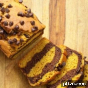 Beautifully marbled turmeric pumpkin chocolate bread, a fusion of vibrant flavors.