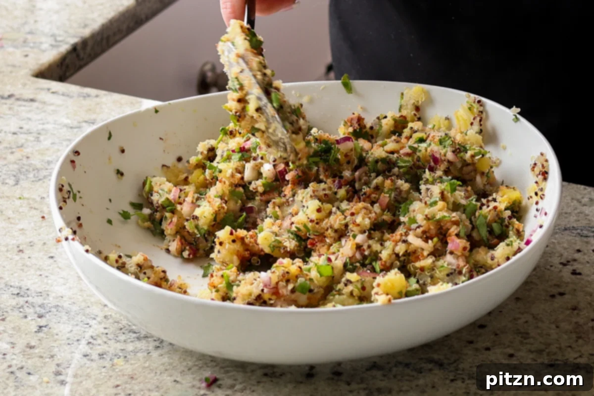 Flavorful Tikki Chole Potato Quinoa Patties and Chickpea Curry 14 mashing the tikki mixture