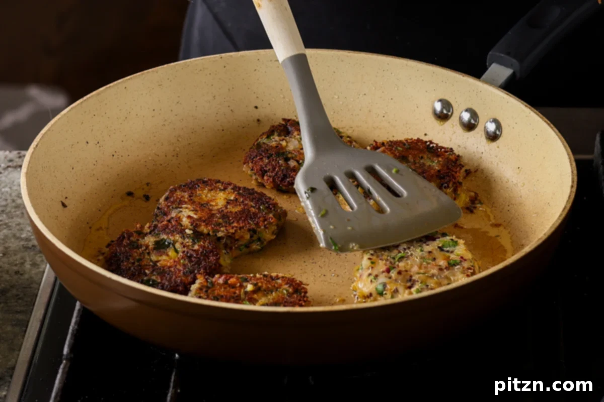 Flavorful Tikki Chole Potato Quinoa Patties and Chickpea Curry 17 flipping the browned tikkis to cook the other side