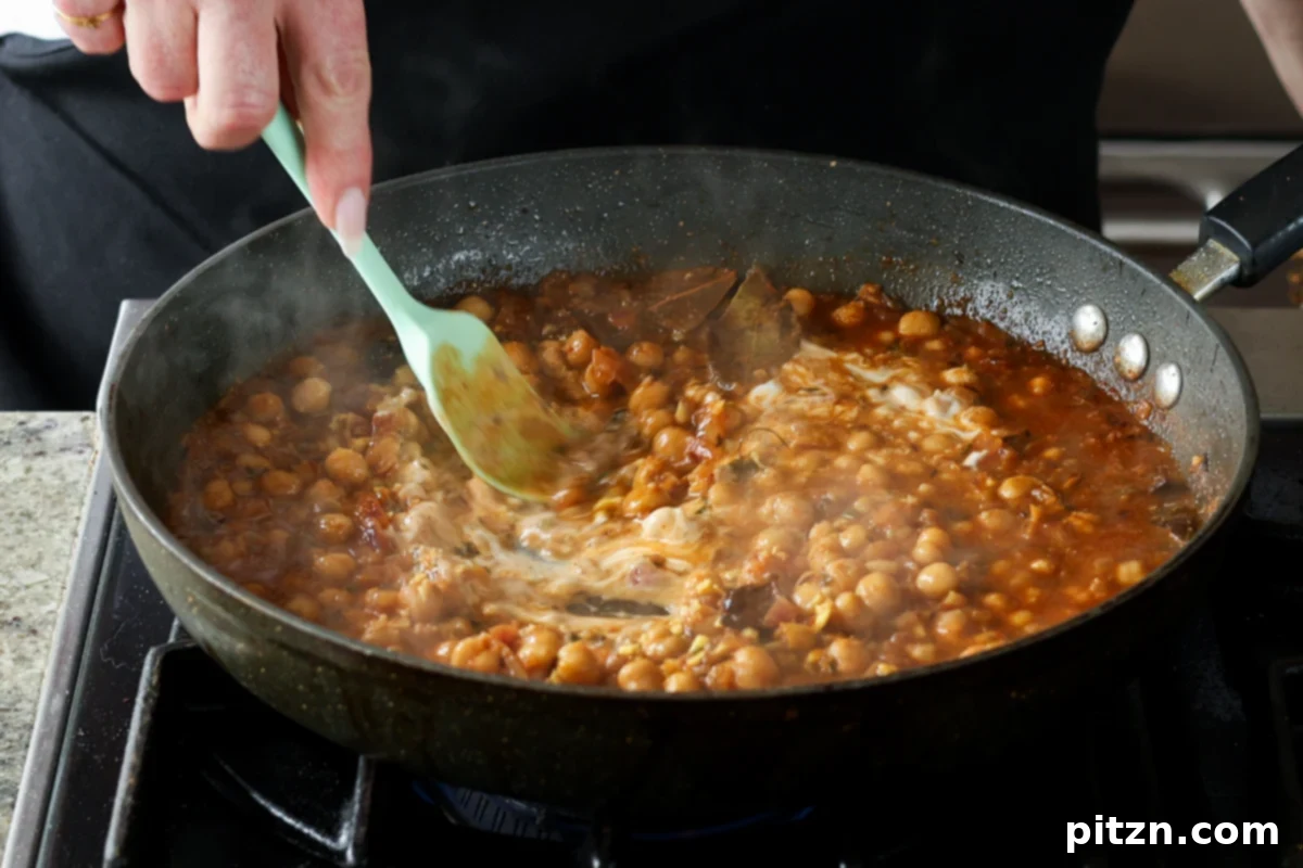 Flavorful Tikki Chole Potato Quinoa Patties and Chickpea Curry 29 mixing in the yogurt