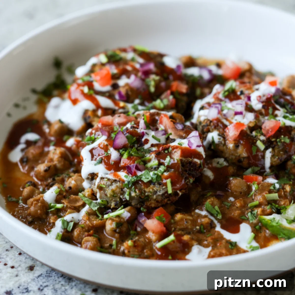 Flavorful Tikki Chole Potato Quinoa Patties and Chickpea Curry 32 tikki chole in a bowl after adding toppings