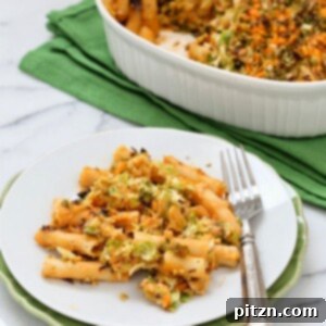 The shaved brussels in this pasta get caramelized with salt and pepper. The melty cheddar mixed in adds a great offset.