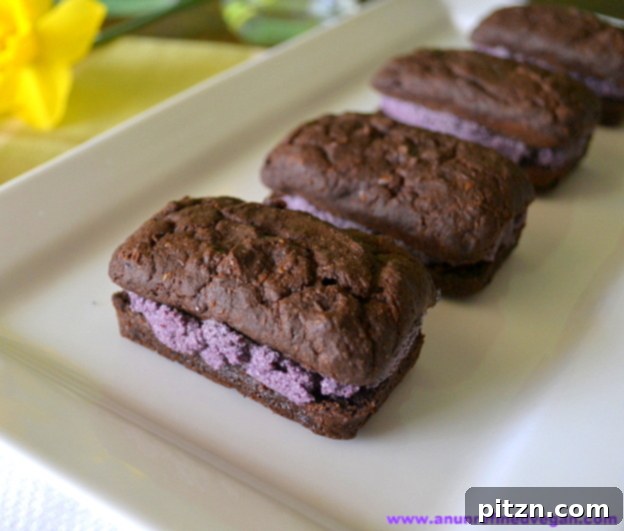 Delicate Chocolate Blueberry Creme Whoopie Pies, perfectly shaped and filled