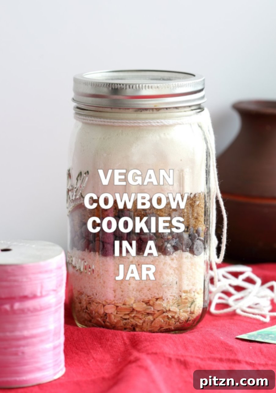 Homemade Vegan Cowboy Cookie Jar Kit 3 Vegan Cowboy Cookies Mix makes great Jar gifts for the Holiday Season. Layer oats, flour, coconut, chocolate sugar and pecans. Mix, add applesauce and oil, and bake. #veganricha #Vegan #Recipe Can be #glutenfree | VeganRicha.com