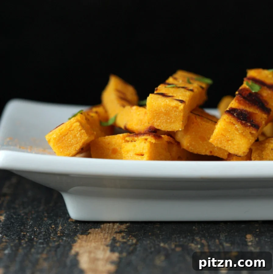Platter of golden Chickpea Kabocha Fries with dipping sauce