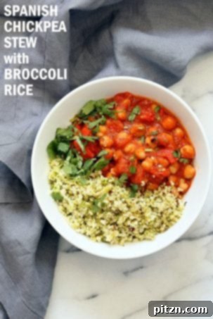 Flavorful Spanish chickpea stew with cumin-scented cauliflower broccoli rice, a smoky, tomatoey, vegan, gluten-free, nut-free, grain-free, and soy-free recipe.
