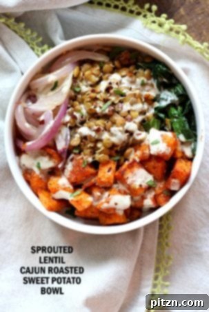 Spiced sprouted lentils and Cajun roasted sweet potato bowl with veggies, greens, and a tahini garlic dressing, a vegan, gluten-free, and soy-free recipe.