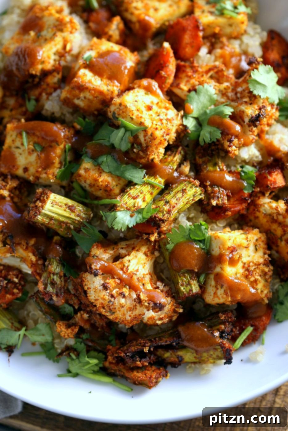 Grilled Tofu and Vegetable Power Bowl 4 Tofu and Veggie BBQ Bowl. Veggies and Tofu tossed in from scratch barbecue seasoning and baked. Serve over quinoa dressed with bbq sauce. #Vegan #Glutenfree #Nutfree #Recipe #veganricha