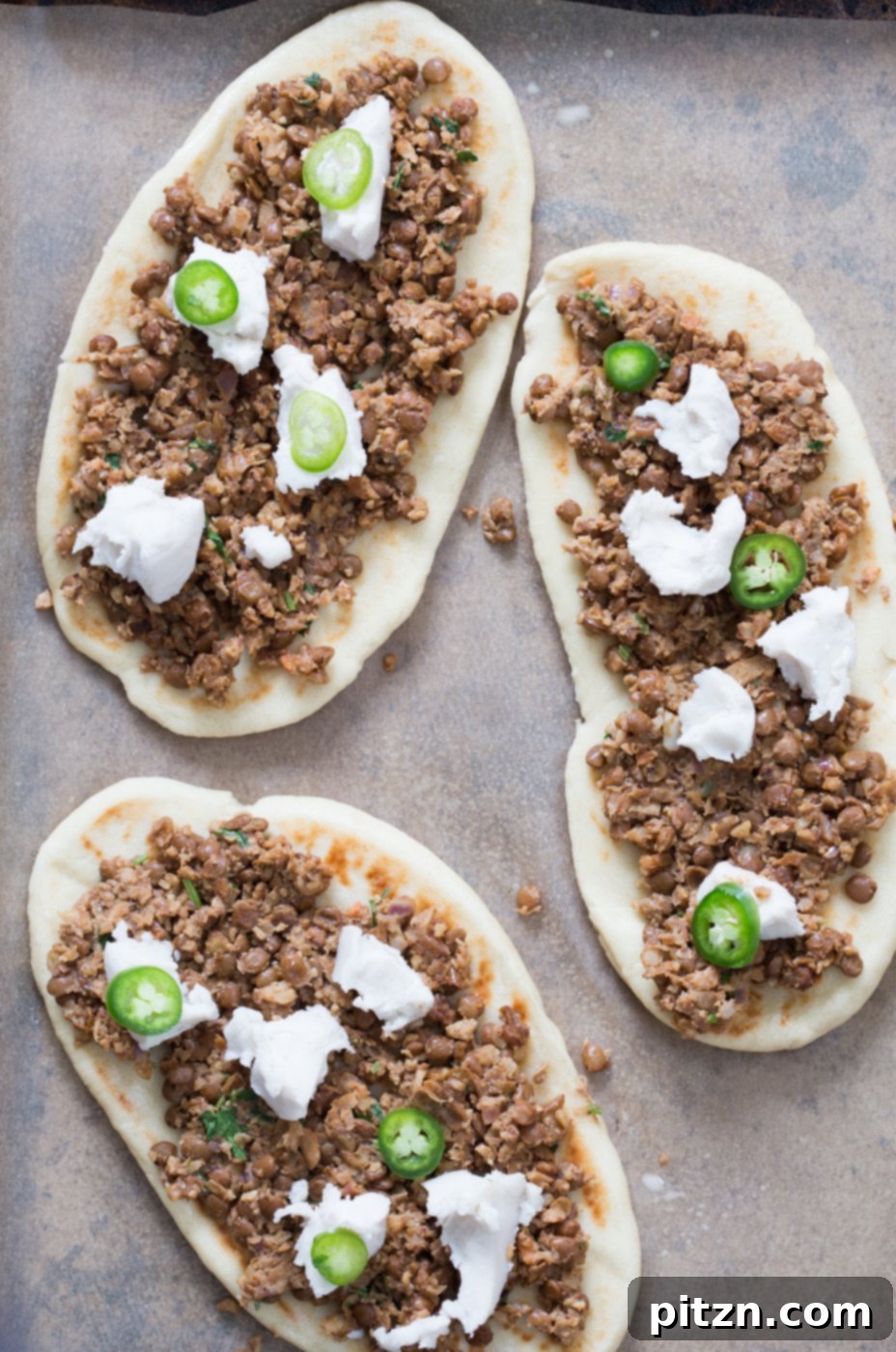 Vegan Lentil Keema Naan 5 Vegan Keema Naan with Keema Lentils, onion, carrots and walnuts. These lentils with the herbs and spices make a vegan version of keema. Serve over Naan bread or Pizza or fill tacos or wraps. #Vegan #Recipe #veganricha, Can be gluten-free and soy free. | VeganRicha,com