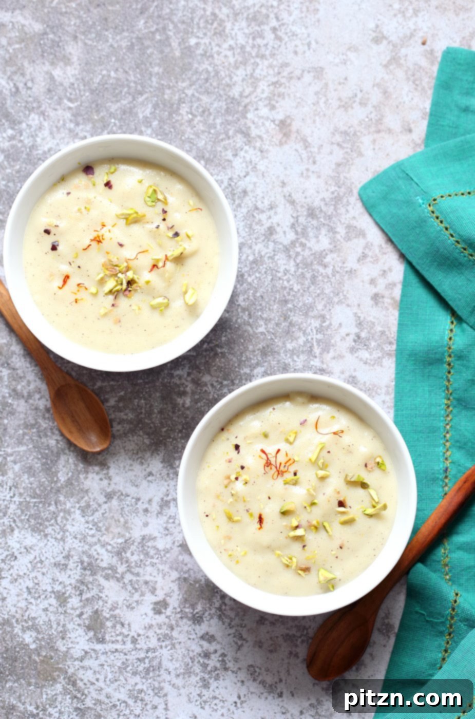 Beautifully presented Thandai Phirni in a bowl, garnished with pistachios