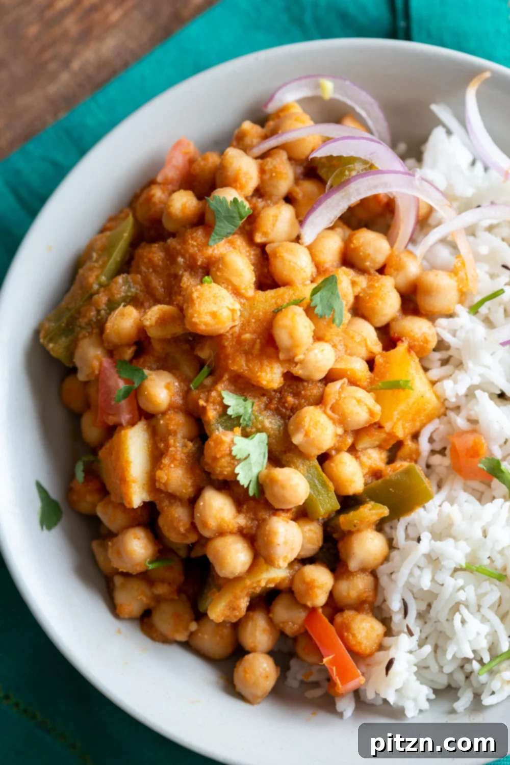 Kadai Chole is a delicious Chickpea curry generally made in wok. 1 Pot 30 min Spiced Chickpeas and Potatoes. Simple Indian sauce paired here with potatoes. #Vegan #Indian #Glutenfree #Soyfree #Nutfree #Recipe #indianvegan #VeganRicha