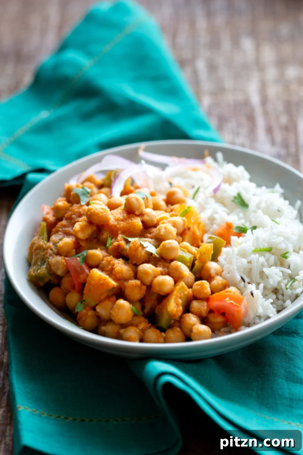 Kadai Chole is a delicious Chickpea curry generally made in wok. 1 Pot 30 min Spiced Chickpeas and Potatoes. Simple Indian sauce paired here with potatoes. #Vegan #Indian #Glutenfree #Soyfree #Nutfree #Recipe #indianvegan #VeganRicha