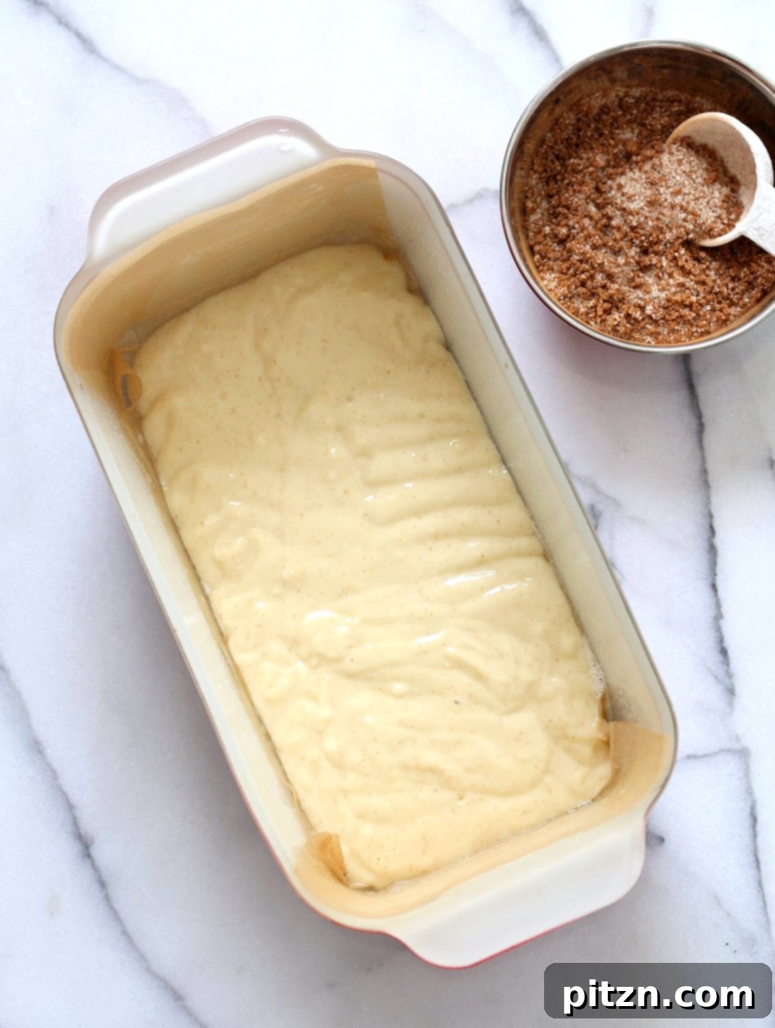 Irresistible Vegan Cinnamon Swirl Cake 6 A beautifully baked Vegan Cinnamon Swirl Cake, showcasing its golden crust and perfect rise. This easy vegan recipe is nut-free and soy-free, with a gluten-free option.