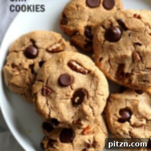 Vegan Paleo Grain free Chocolate Chip Cookies with Coconut flour and Almond Butter. These fudgy cookies are a perfect treat or snack. No refined oil and no refined sugar. #Vegan #Glutenfree #Grainfree #paleo #Recipe #veganricha | VeganRicha.com
